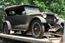 The 1924 Stanley Model 750 is in the condition it was found in, so it shows signs of rust and the wheel spokes are a similar shade to the body